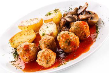 Roast meatballs with potatoes