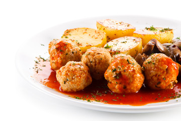 Roast meatballs with potatoes