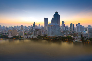 Obraz na płótnie Canvas City skyscraper with sunrise view.