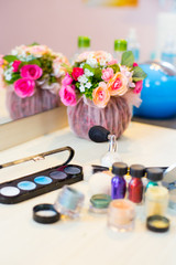 Obraz na płótnie Canvas Different makeup items on the table