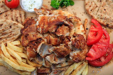 Greek gyros dish on baking paper - top view