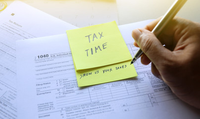 Tax Time show us your taxes Businessman