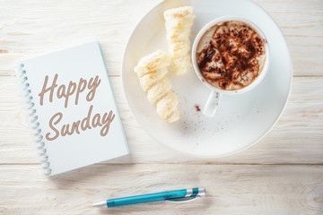 Sketchpad and a cup of hot cocoa