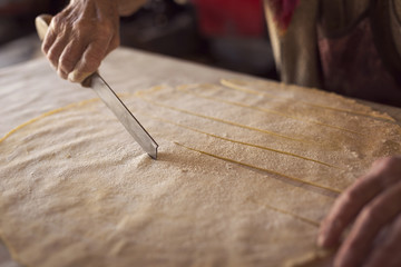 Cutting dough strips