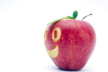 red apple, smiling face, food concept