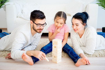 Family playing jenga