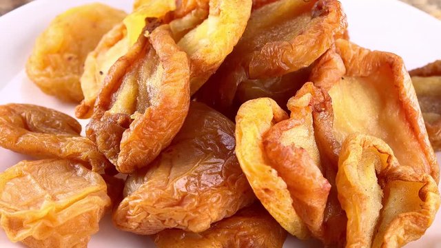 Portion of rotating dried Pears (seamless loopable) as 4K UHD footage
