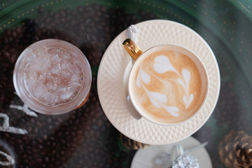 Hot fresh coffee in white cup