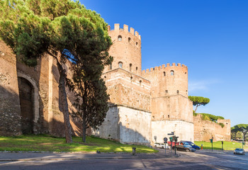 Fototapeta na wymiar Rome, Italy. Wall of Aurelian: the gate of St. Sebastian (Porta San Sebastiano, or Porta Appia), 275 AD