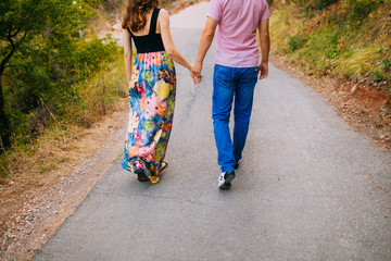 Female and male feet on the pavement. Wedding in Montenegro