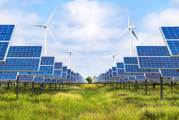 solar panels and wind turbines generating electricity in  power station alternative energy from...