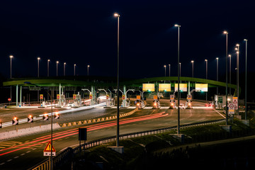 highway toll booth in the night