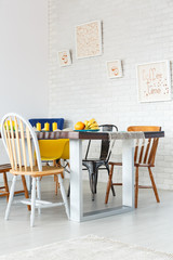 Dining room with brick wall