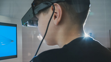 Child checks vision with the stereo video virtual reality glasses - ophthalmology clinic