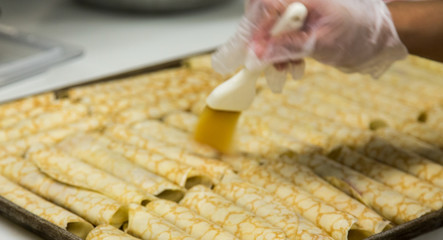 Brushing Butter on Cannolis