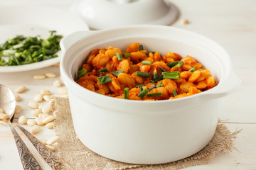 Baked lima beans in white pot