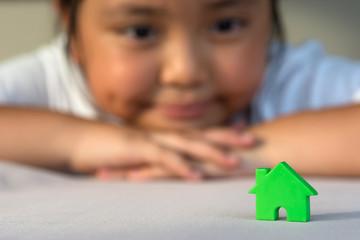 Asian girl playing house model, select focus