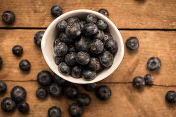 Blueberry Honey with blueberries and liquid honey in jar