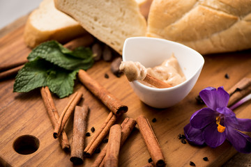 Cinnamon Creamed Honey in Bowl with Bread