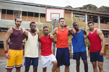 Fototapeta premium Basketball players standing in basketball court