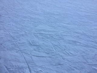 Ice scratches surface for texture or background, winter closeup top view image