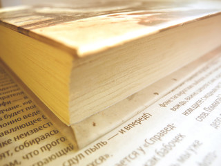 Obraz premium Closed book on words background 