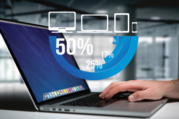 Blue survey graph interface with business theme going out a laptop - Technology concept