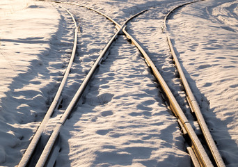 Two railway tracks merge