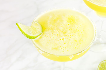 Lemon Margarita cocktail closeup with a place for text