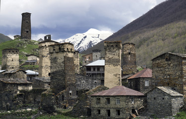 Settlement of Ushguli, with watchtowers in the background of mountains, Svaneti