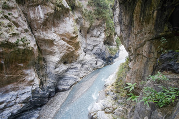 River flows through the mountains.