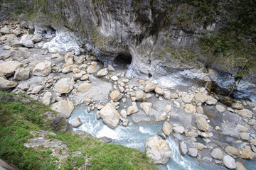 River flows through the mountains.