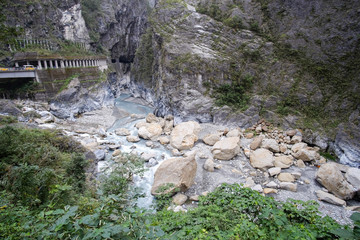 River flows through the mountains.