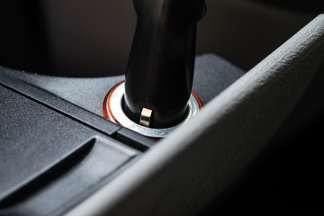 Charger plug on a luxury car