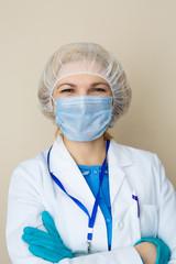 Doctor in mask, gloves, coat