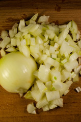 Chopped onion on a wooden table
