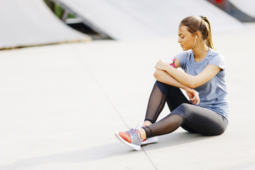 Young woman having exercise outdoors