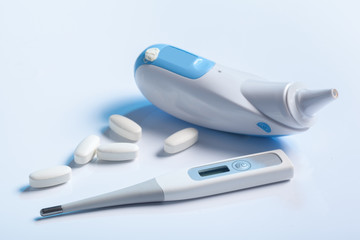 thermometer and pills