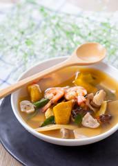 Thai Spicy Mixed Vegetable Soup with Prawns, Kang Liang Goong Sod, Traditional Thai food, selective focus
