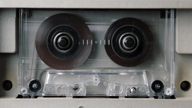 Audio cassette playing. Seamless looping. Contains alpha matte.