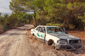 Obraz na płótnie Canvas Abandoned car in Ibiza, Spain