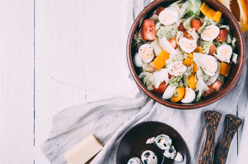 Salad with quail eggs. Light style