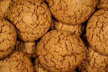 Stack of the oatmeal cookies on wooden table