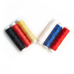 Colored thread on white