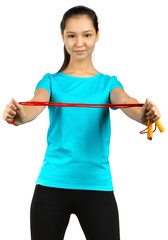 Charming woman holding skipping rope