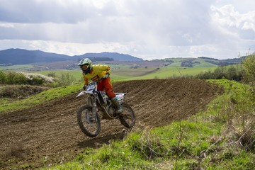 Obraz premium Motorcyclist riding off road. Slovakia