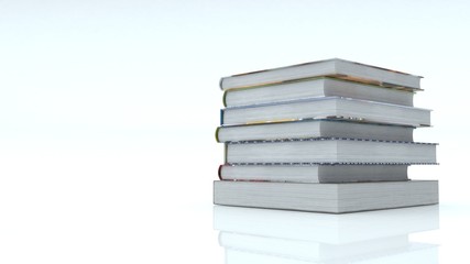 Blank books stack on white background.