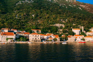 Fototapeta na wymiar The old fishing town of Perast on the shore of Kotor Bay in Montenegro.