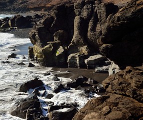 Wild beaches of sand and rocks, Aguimes coast, Gran canaria, Canary islands