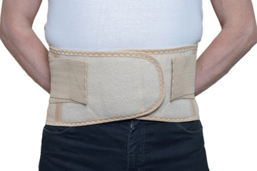 man with medical abdominal bandage chest post-operative 